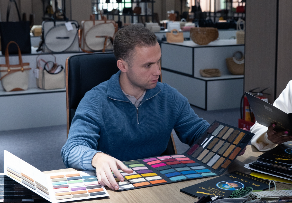 ZAROS founder and leather goods